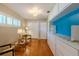 Bright bedroom with hardwood floors, plantation shutters, stylish furnishings and ample built-in storage at 2001 Lily Ct, Sanford, FL 32771