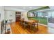 Dining room boasting hardwood floors and open to kitchen with stainless appliances, offering a seamless flow at 2001 Lily Ct, Sanford, FL 32771