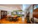 Spacious dining room featuring hardwood floors and seamlessly connects to the adjacent kitchen at 2001 Lily Ct, Sanford, FL 32771