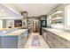 Spacious kitchen with modern appliances, gray cabinets, marble countertops, and open layout at 2001 Lily Ct, Sanford, FL 32771