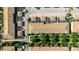 Aerial view of multiple townhouses with patios and green spaces in a well-maintained neighborhood at 2030 Majorca Dr, Kissimmee, FL 34747