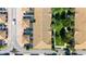 Aerial view of townhouses with private patios, swimming pools, and green spaces at 2030 Majorca Dr, Kissimmee, FL 34747