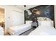 Themed bedroom with two twin beds, a unique space wallpaper, and natural lighting at 2030 Majorca Dr, Kissimmee, FL 34747