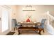 Elegant dining room with modern lighting fixture, and seating for six at 2030 Majorca Dr, Kissimmee, FL 34747