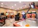 Entertainment room featuring video games and an air hockey table, perfect for recreation and fun at 2030 Majorca Dr, Kissimmee, FL 34747