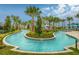 Beautiful lazy river with lush landscaping, clear water and inviting resort style relaxation at 2030 Majorca Dr, Kissimmee, FL 34747