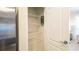 Walk-in pantry featuring white wire shelving for organized storage solutions at 2030 Majorca Dr, Kissimmee, FL 34747