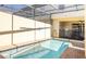 Private backyard pool is screened in for outdoor enjoyment and relaxation at 2030 Majorca Dr, Kissimmee, FL 34747