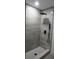 Modern bathroom with a sleek, tiled shower and rainfall showerhead at 240 W Palmetto Ave, Deland, FL 32720
