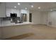 Bright kitchen featuring modern appliances, white cabinets, and a functional island at 240 W Palmetto Ave, Deland, FL 32720
