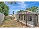 Backyard view shows the screened lanai and privacy fence at 2468 Cimmaron Ash Way, Apopka, FL 32703