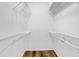 Walk-in closet with installed shelving units at 2468 Cimmaron Ash Way, Apopka, FL 32703
