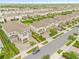 Real estate showing street view of houses, manicured lawns, and neighborhood landscaping with cars parked at 257 Auburn Ave, Kissimmee, FL 34747