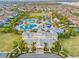Extensive community waterpark with pools, slides, clubhouse, green spaces, amenities, and neighborhood homes at 257 Auburn Ave, Kissimmee, FL 34747