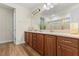 Bathroom with a double sink vanity and walk-in shower at 257 Auburn Ave, Kissimmee, FL 34747
