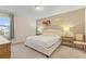 Bedroom with light-colored walls, warm carpet and decor at 257 Auburn Ave, Kissimmee, FL 34747