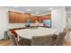 Well-equipped kitchen with a central island, stainless steel appliances, and beautiful cabinetry at 257 Auburn Ave, Kissimmee, FL 34747