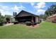 Expansive backyard featuring a screened porch and meticulous landscaping at 2656 Whisper Lakes Club Cir, Orlando, FL 32837