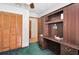 Bedroom with a ceiling fan, wood flooring, and plenty of storage at 2656 Whisper Lakes Club Cir, Orlando, FL 32837
