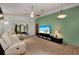 Spacious living room with comfortable seating and ample natural light at 2656 Whisper Lakes Club Cir, Orlando, FL 32837