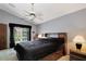 Relaxing main bedroom with a ceiling fan, natural light and neutral paint at 2656 Whisper Lakes Club Cir, Orlando, FL 32837