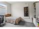 Comfortable bedroom featuring neutral walls, carpet, and window at 2723 Forestdale St, St Cloud, FL 34771