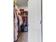 Spacious walk-in closet with ample storage for clothing and accessories, providing convenient organization at 2723 Forestdale St, St Cloud, FL 34771