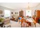 Spacious living and dining area with large windows and ample natural light at 2745 University Acres Dr, Orlando, FL 32817