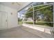 Screened patio with a view of the backyard at 2745 University Acres Dr, Orlando, FL 32817
