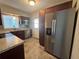 The updated kitchen features stainless steel appliances and modern fixtures at 2808 Drake Dr, Orlando, FL 32810
