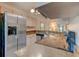 Bright kitchen featuring stainless steel appliances and stone countertops at 289 N Wilderness Pt, Casselberry, FL 32707