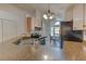 Kitchen featuring stainless steel appliances, granite countertops, and ample cabinet space at 289 N Wilderness Pt, Casselberry, FL 32707