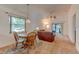 Inviting living room with carpet, vaulted ceiling, and lots of natural light at 289 N Wilderness Pt, Casselberry, FL 32707