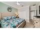 Relaxing bedroom showcases a decorative headboard and a spacious closet at 2999 Buccaneer Palm Rd, Kissimmee, FL 34747