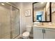 Bright bathroom with a shower, white vanity, and modern fixtures at 3069 White Orchid Rd, Kissimmee, FL 34747