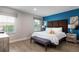 Bright bedroom with a king-sized bed, contemporary decor, and plenty of natural light at 3069 White Orchid Rd, Kissimmee, FL 34747