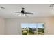 Living area with a ceiling fan and bright windows at 312 Arbor Lakes Dr, Davenport, FL 33896