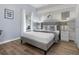 Bright bedroom with a gray accent wall and a window for plenty of natural light at 3193 Yellow Lantana Ln, Kissimmee, FL 34747