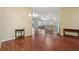Spacious dining area with hardwood flooring, ample natural light, and an open layout at 3198 Abana Path, The Villages, FL 32163