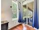 Bedroom with view of the screened lanai through large sliding glass doors at 3380 Pawleys N Loop, St Cloud, FL 34769