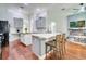 Spacious kitchen with center island, modern appliances, and stylish countertops at 3380 Pawleys N Loop, St Cloud, FL 34769