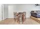 Cozy living space featuring a small table with chairs and comfortable leather seating at 3380 Pawleys N Loop, St Cloud, FL 34769