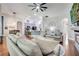 Bright open-concept living space seamlessly connects living, dining, and kitchen areas at 3380 Pawleys N Loop, St Cloud, FL 34769