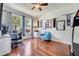 Bright office with hardwood floors, a large window, and contemporary decor for a productive workspace at 3380 Pawleys N Loop, St Cloud, FL 34769