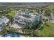 Aerial view of community clubhouse featuring impressive architectural design and surrounding landscapes at 341 Falls Dr, Kissimmee, FL 34747