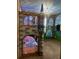 This princess themed bedroom features custom castle bunk beds, artwork and a chandelier at 341 Falls Dr, Kissimmee, FL 34747