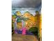 The whimsical themed bedroom features custom Avatar themed artwork and detailed wall paintings at 341 Falls Dr, Kissimmee, FL 34747