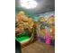 This Avatar themed bedroom features a unique bunk bed, custom artwork and detailed wall paintings at 341 Falls Dr, Kissimmee, FL 34747