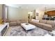 Stylish living room with modern furnishings, a decorative rug, and an open layout at 341 Falls Dr, Kissimmee, FL 34747
