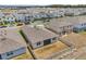 An aerial view of the house with fenced in backyard and screen patio at 3981 Great Smokey Way, Apopka, FL 32712